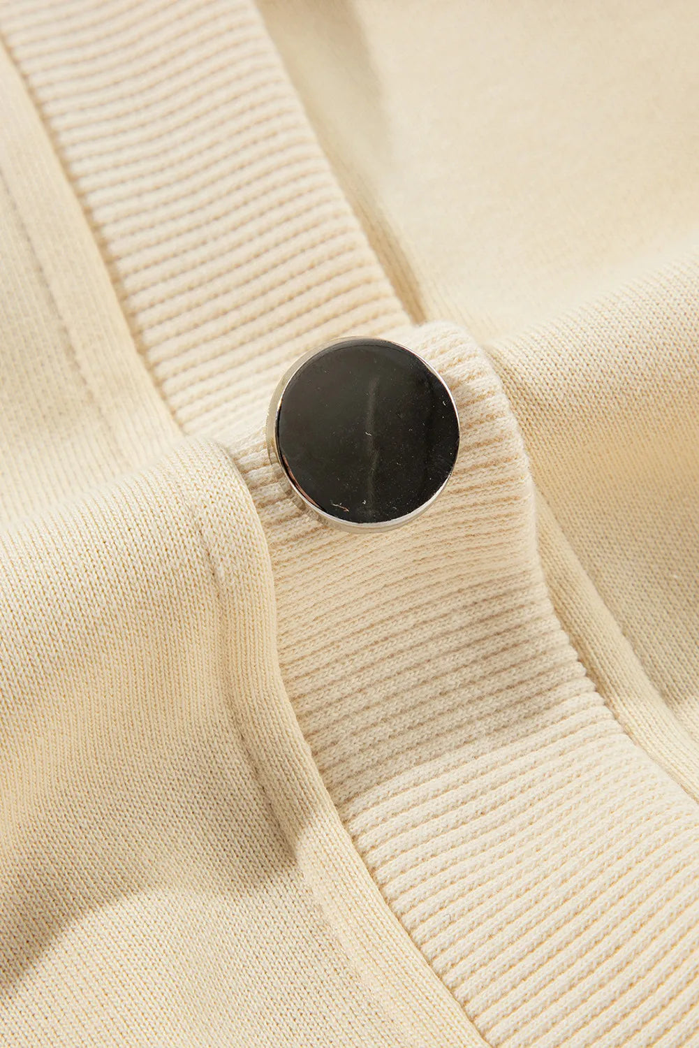 Light yellow asymmetrical collar button up sleeves off shoulder sweatshirt
