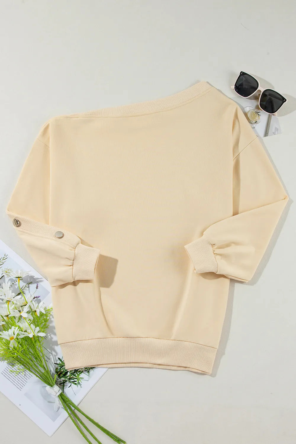 Light yellow asymmetrical collar button up sleeves off shoulder sweatshirt