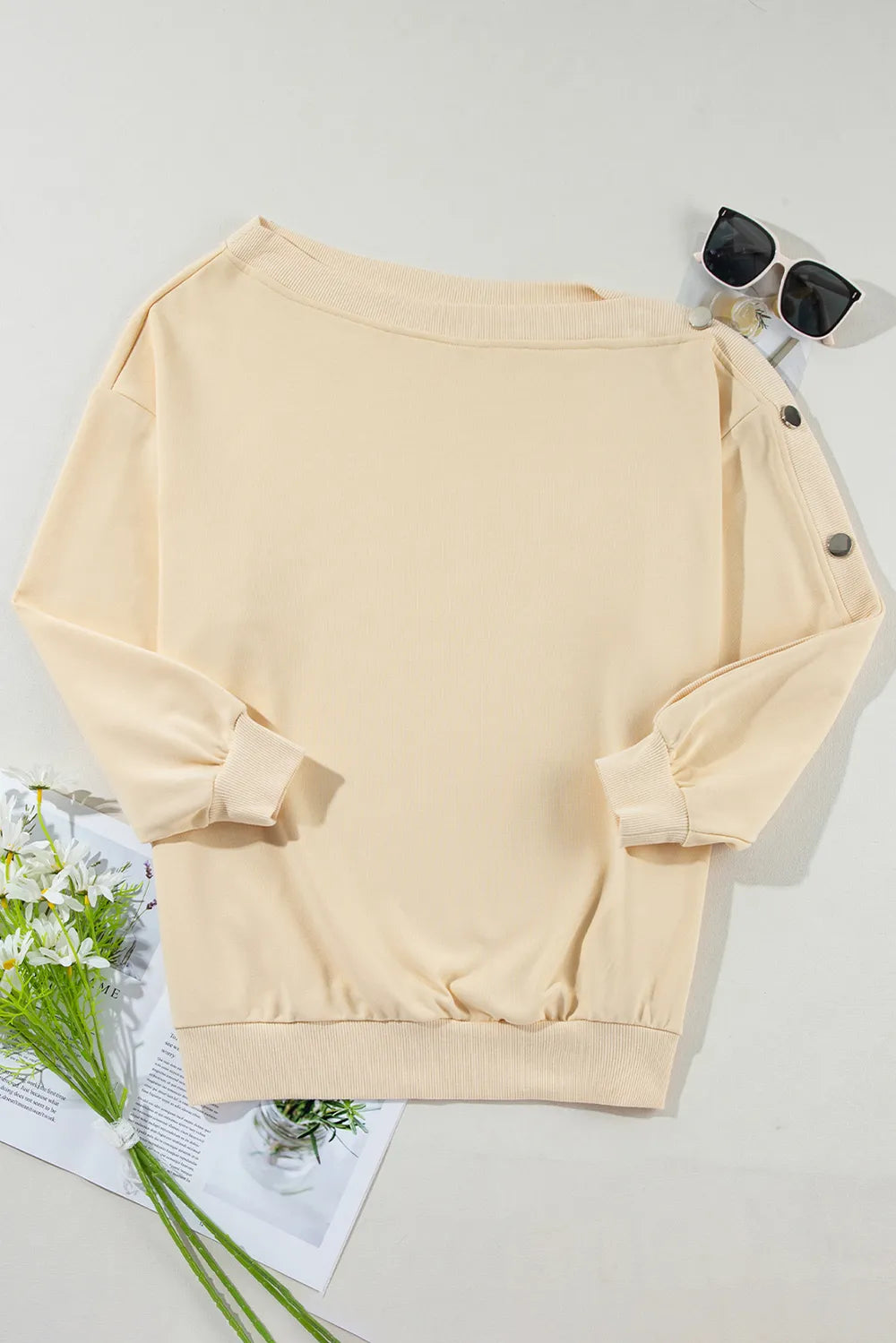Light yellow asymmetrical collar button up sleeves off shoulder sweatshirt