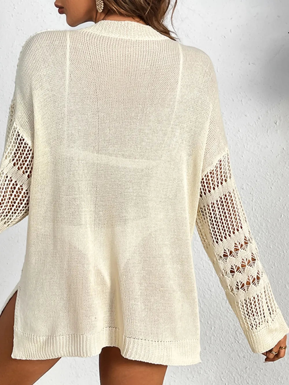 Hollow out top long sleeved beach top