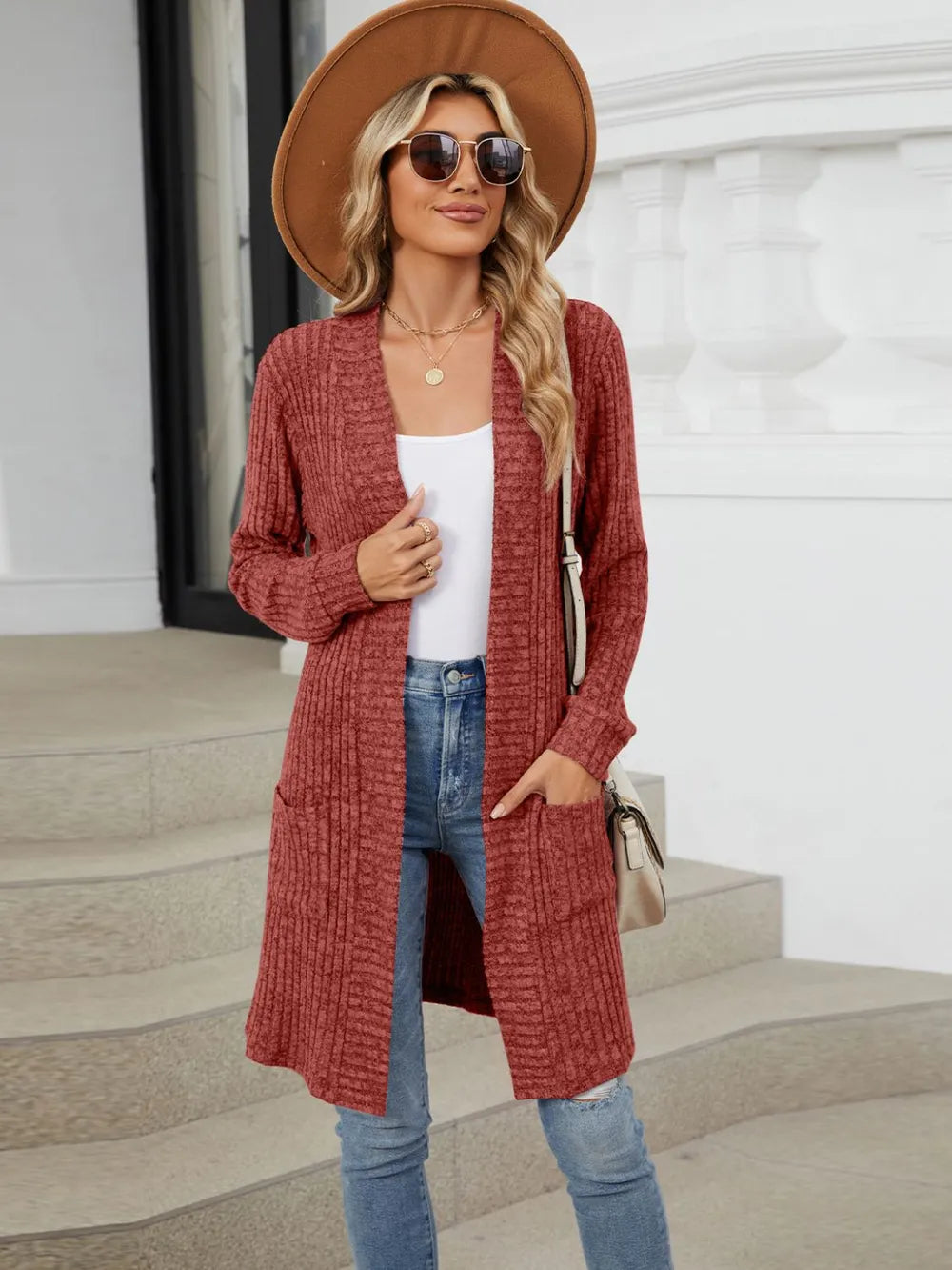 Autumn and winter long color long sleeved loose pocket cardigan jacket for women