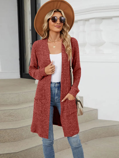 Autumn and winter long color long sleeved loose pocket cardigan jacket for women
