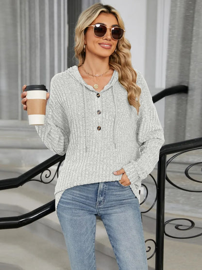 Autumn and winter new solid color hooded button loose long sleeved top