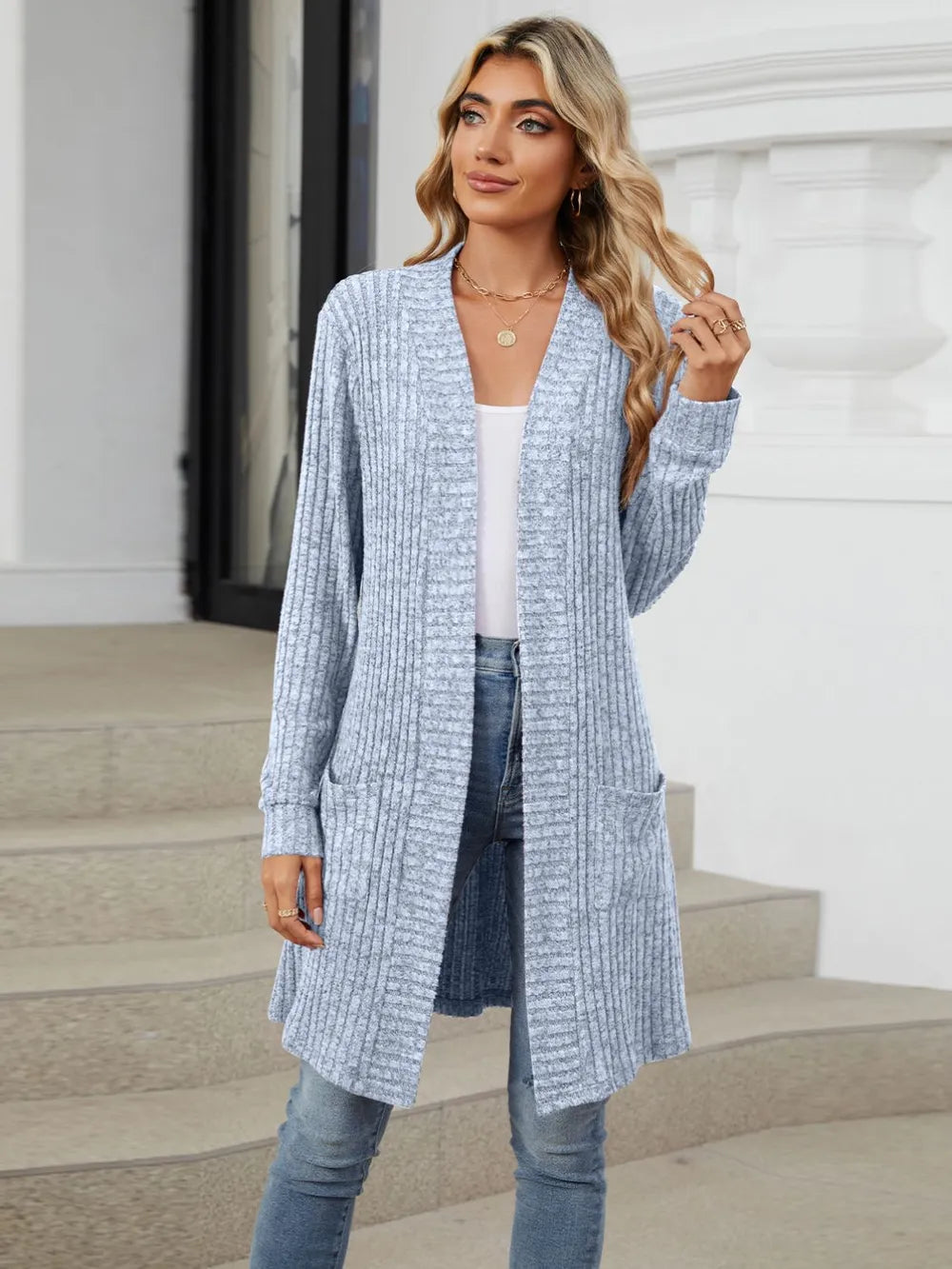 Autumn and winter long color long sleeved loose pocket cardigan jacket for women