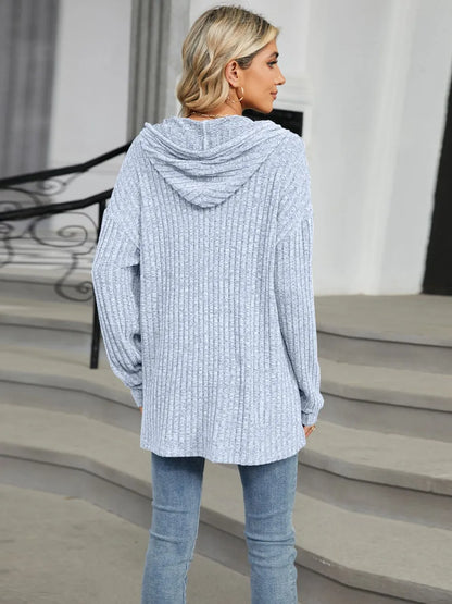 Autumn and winter new solid color hooded button loose long sleeved top
