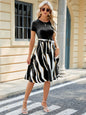 Spring and summer new round neck patchwork printed short sleeved dress with large swing